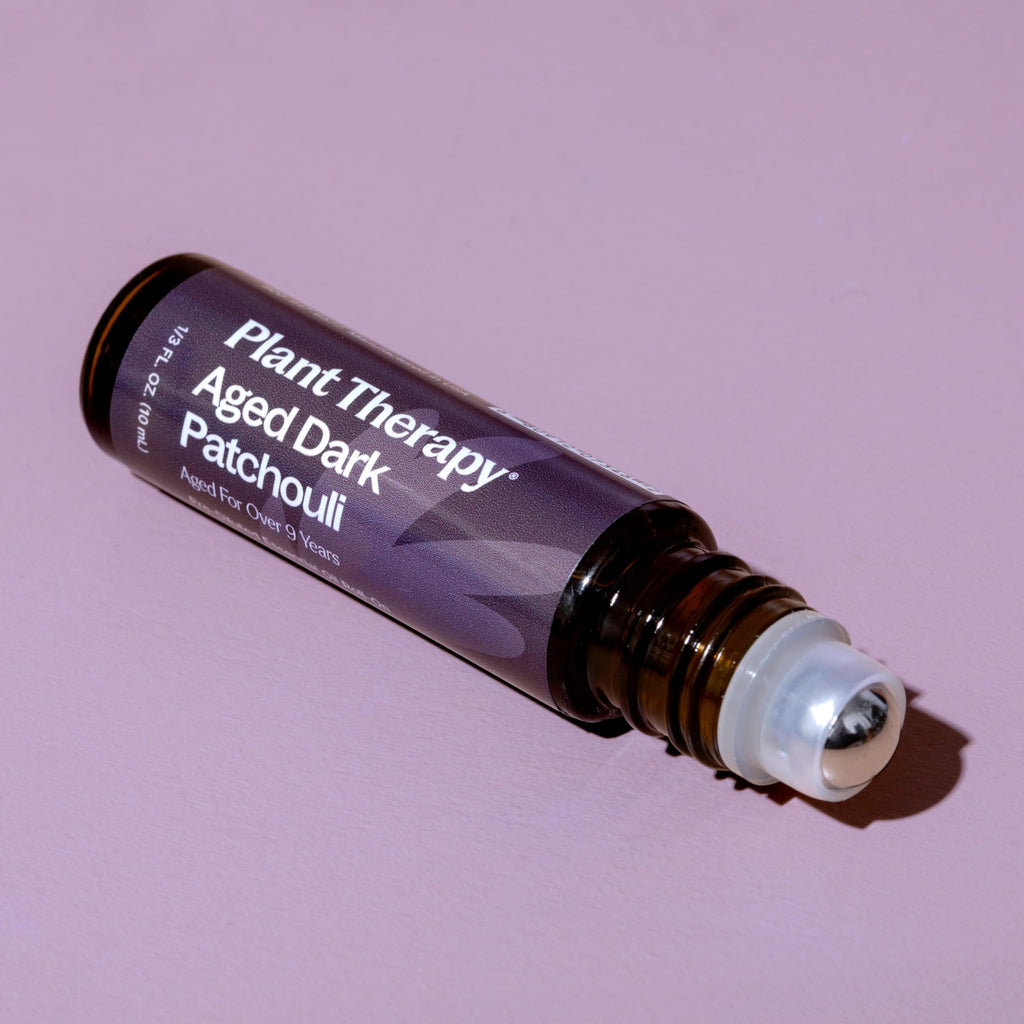 Plant Therapy Aged Dark Patchouli Essential Oil Roll-On 10 mL (1/3 oz) Pre-Diluted in Fractionated Coconut Oil, Long-Lasting, Personal Fragrance,100% Pure, Natural, Expertly Aged for Depth, Rich Aroma
